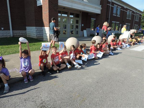 students on the sidewalk